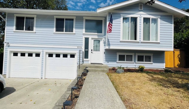 Renovated, modern home in a quiet area with a game room and spacious backyard