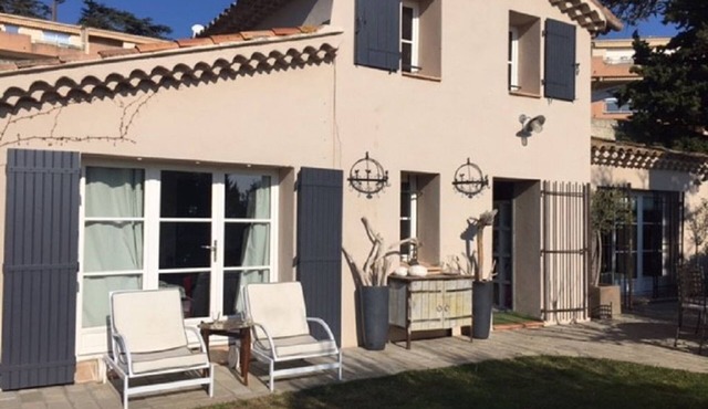 Renovated old house with garden and pond.