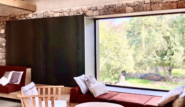 Renovated stone barn with terrace overlooking the countryside
