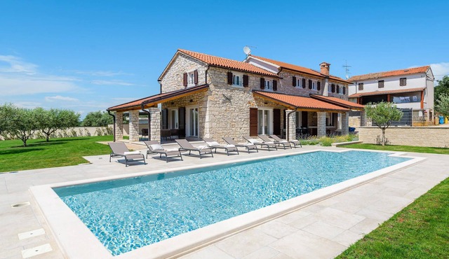 Renovated stone house in a quiet location ? ideal for two families.