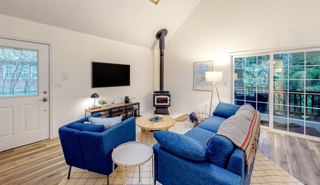 Renovated, three-story home by the beach with a furnished deck & washer/dryer