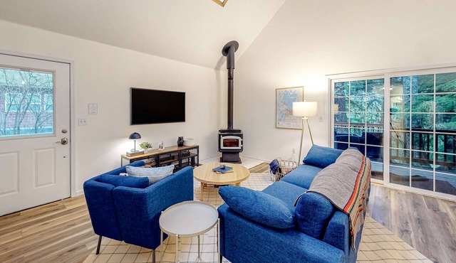 Renovated, three-story home by the beach with a furnished deck & washer/dryer