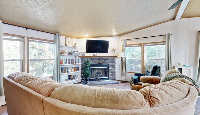 Renovated Woodland home with decks, pool table, firepit - near Petenwell Lake