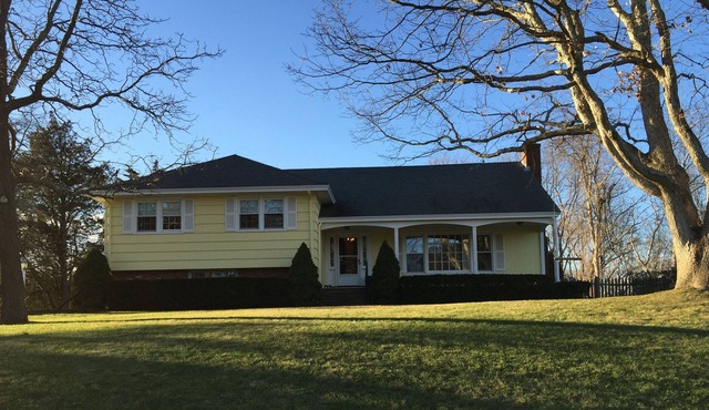 Rent on a quiet street steps from the beach in the heart of historic Watch Hill