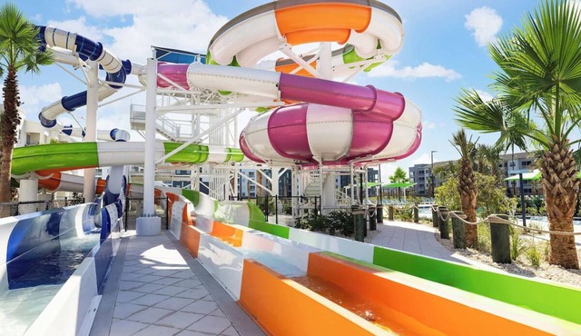 Resort-Access Getaway with Giant Pool, Slides, Themed Rooms & More