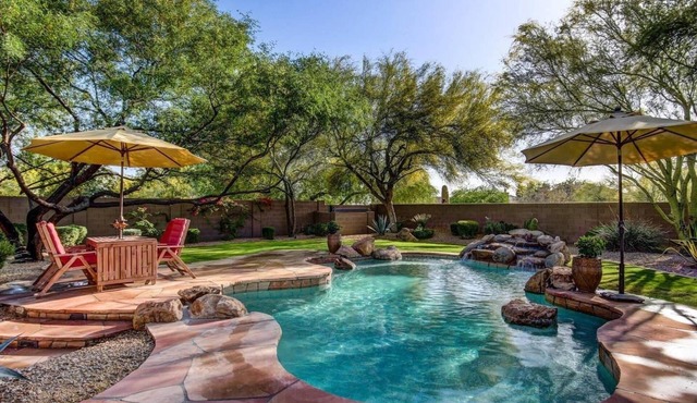 Resort like backyard w/Heated pool. Home Theater