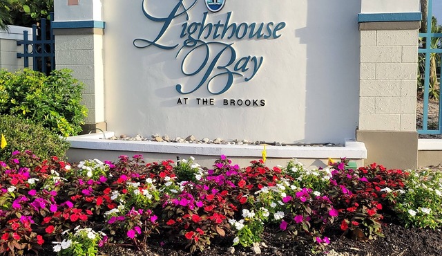 Resort living-6 pools, tennis, boche and more! Lakefront unit!