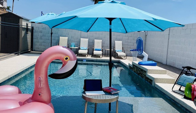 Resort Style Backyard- Heated Pool, Putting Green, Outdoor TV and Pool Table.