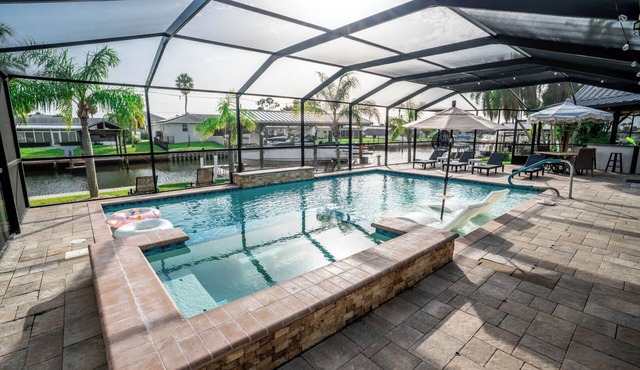 Resort-Style Canal Home w/Pool & Putting Green - Baywatch