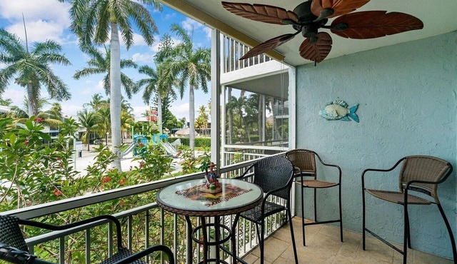 Resort-style condo short walk from the ocean, includes golf cart.