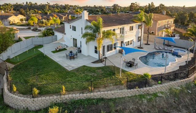 Resort-style Home with stunning views, pool, hot tub, putting green