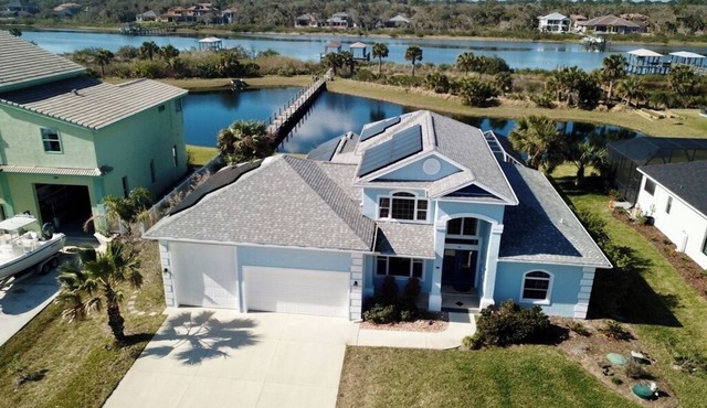Resort-Style Living:Beautiful Beach Home with heated saltwater pool and hot tub