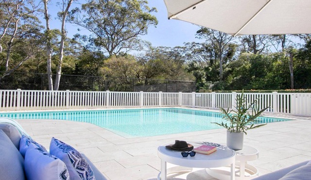 Resort style living with pool, tennis court and beach