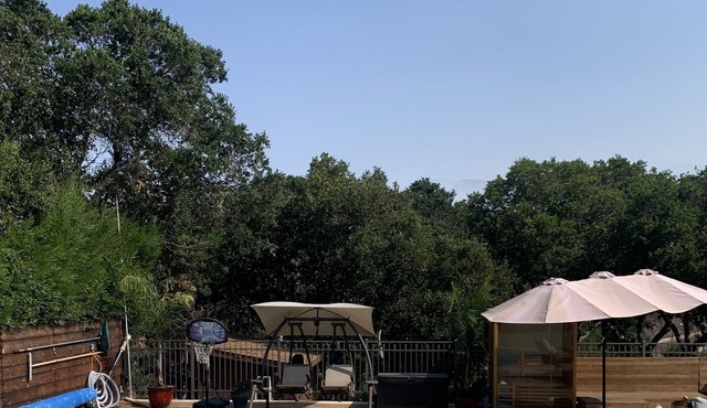 Resort style pool, private hot tub await you at this renovated, charming studio