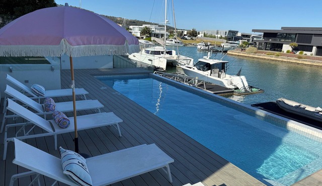 Resort style waterfront living - waterfront swimming pool and private jetty.