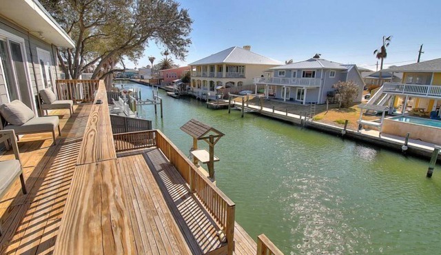 Rest by the Bay | Canal Views, Patio, Boat Dock!