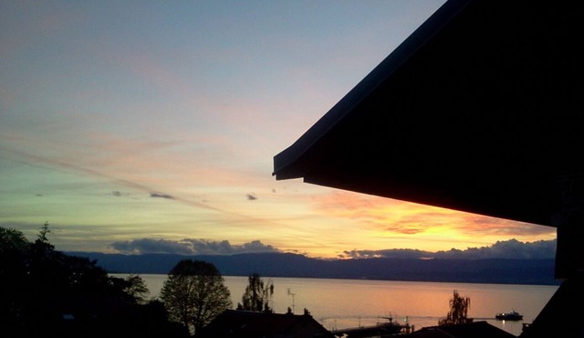 Restored fisherman's house View of Lake Geneva on the port of Thonon Rives