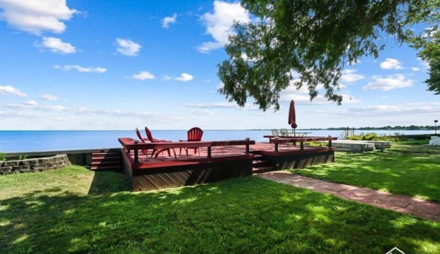 Restored historic log cabin and deck on Lake Erie