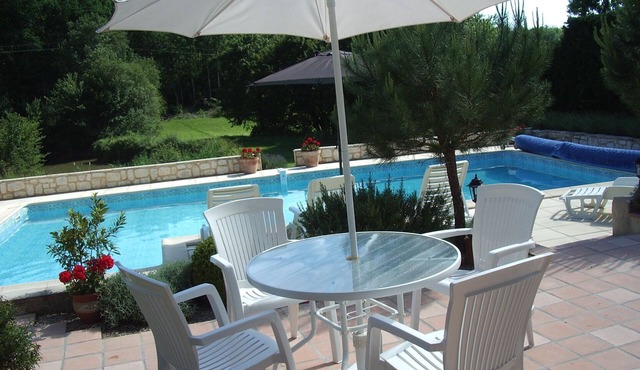 Restored house with private pool and views to the wooded hillside and small lake