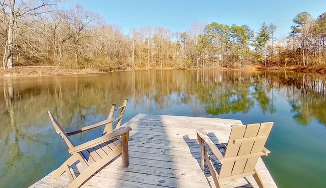 Retreat by the water with a hot tub, washer/dryer, and central air-conditioning