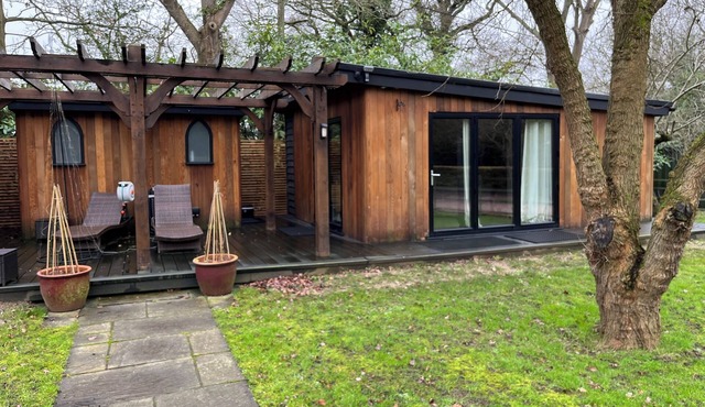 Retreat to a tranquil 30sqm Cedar wood cabin on a 3 acre country estate.