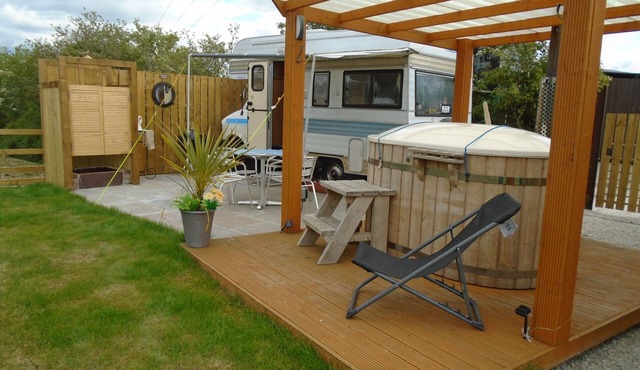 retro 70,s bedford camper with own hot tub , sauna and pool by reservation