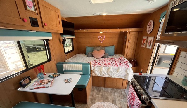 Retro camper trailer on shores of Lake Buchanan