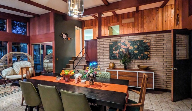 Retro lakeview stay with hot tub, game room, and nearby golf and skiing.