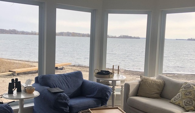 Revel at this lovely private beach house on the lake :-)