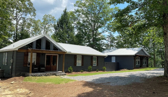 Revive at beautiful Smith Lake! This property offers something for everyone!