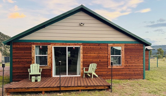 Ride the trails, reel in the fun, relax in the mountains at this Cozy Cabin