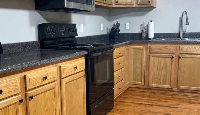 Ride to the trails! Comfortable 5 bedroom house, large parking area!