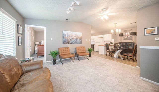 Right at Home-Uptown Place with gated yard and covered parking