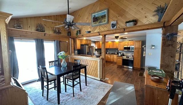 Right off the main trail system! Heated garage large parking for large trailers