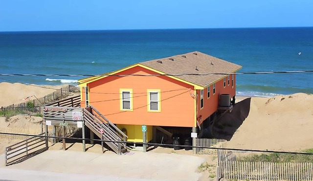 Right on the beach and dog friendly large great room/dining/kitchen area