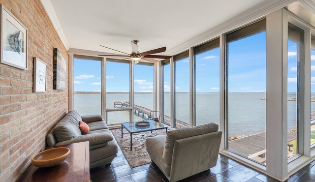 Right on the ship channel! This spacious 2-bedroom, 2-bath condo offers stunning