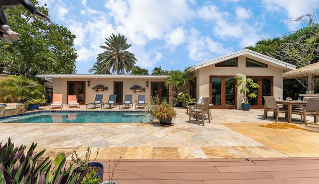 RISE AND SHINE ~ Canal Front 3 BR/3Ba Home w/Heated Pool!