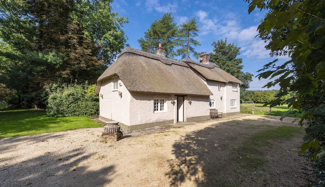 River cottage sits in a pretty rural setting with its own enclosed garden
