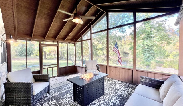 River front getaway with screened-in porch overlooking the river!