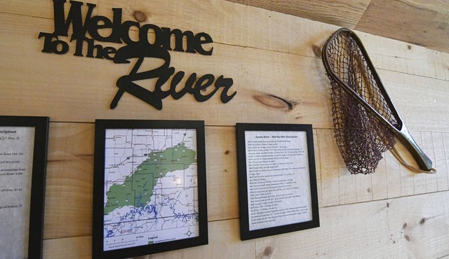 Riverfront cabin located in town yet steps away from total wilderness