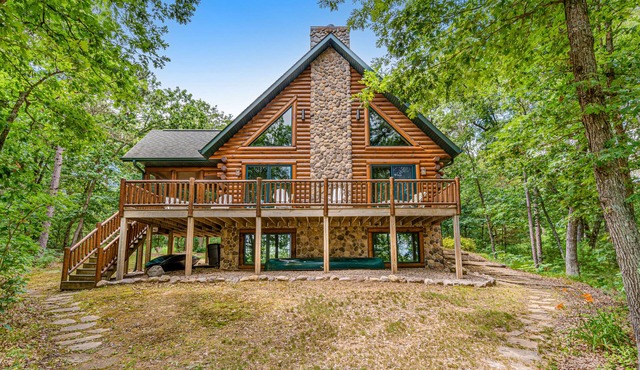 Riverfront cabin with a dock, kayaks and a canoe - firepit and water views