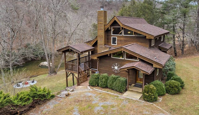 Riverfront Cabin with Hot Tub and Game Room