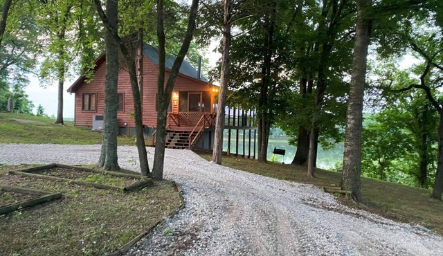 Riverfront cabin with hot tub and amenities galore!