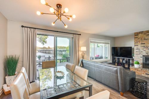 Riverfront Champlin Townhome with Deck and Water View!
