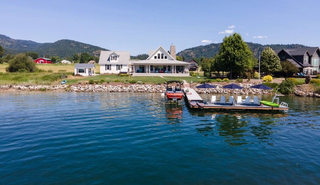 Riverfront custom home with private dock, hot tub, firepit, game room, grill, AC