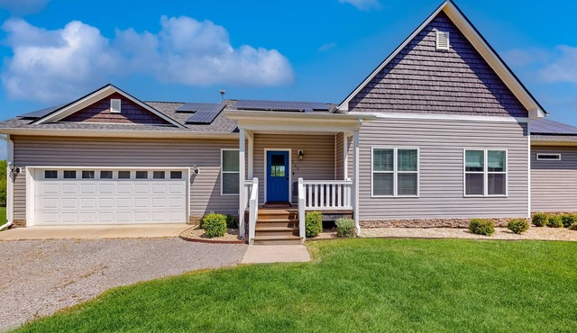Riverfront, dog-friendly home with large property, playhouse, firepit & den