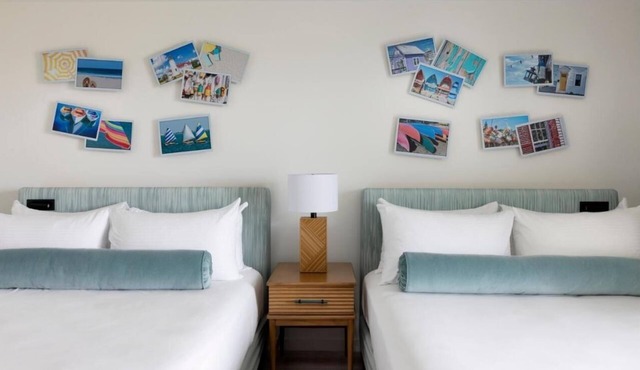 Riverfront Dreams: 2 Queens, Red Jacket Resort, Two Relaxing Rooms