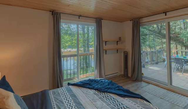 Riverfront Getaway with Hot Tub and Scenic Views