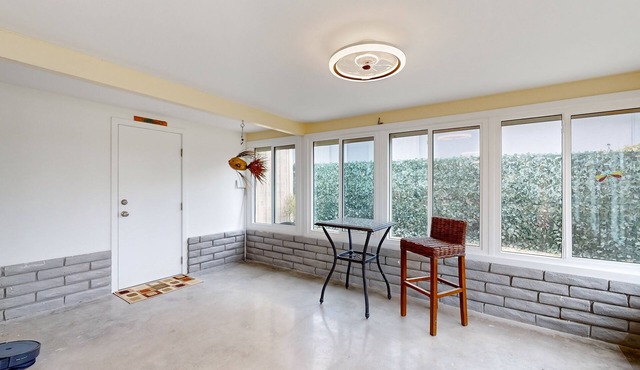 Riverfront home near downtown with dolphin sightings, private dock & home office