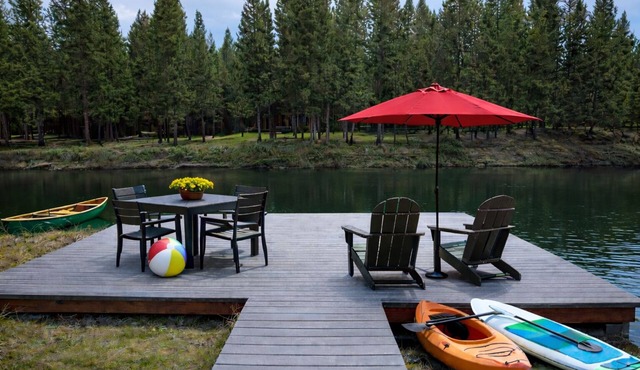 Riverfront home sleeps 14 with Dock and Game Room.